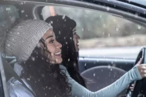 Two woman in car during winter
